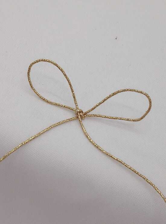 Rotolo 44mt cordoncino 1 mm oro - immagine 2